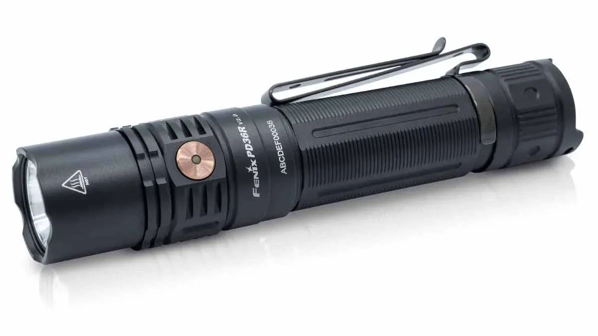 Fenix PD36R V2.0 rechargeable flashlight with its pocket clip, seen from the side.