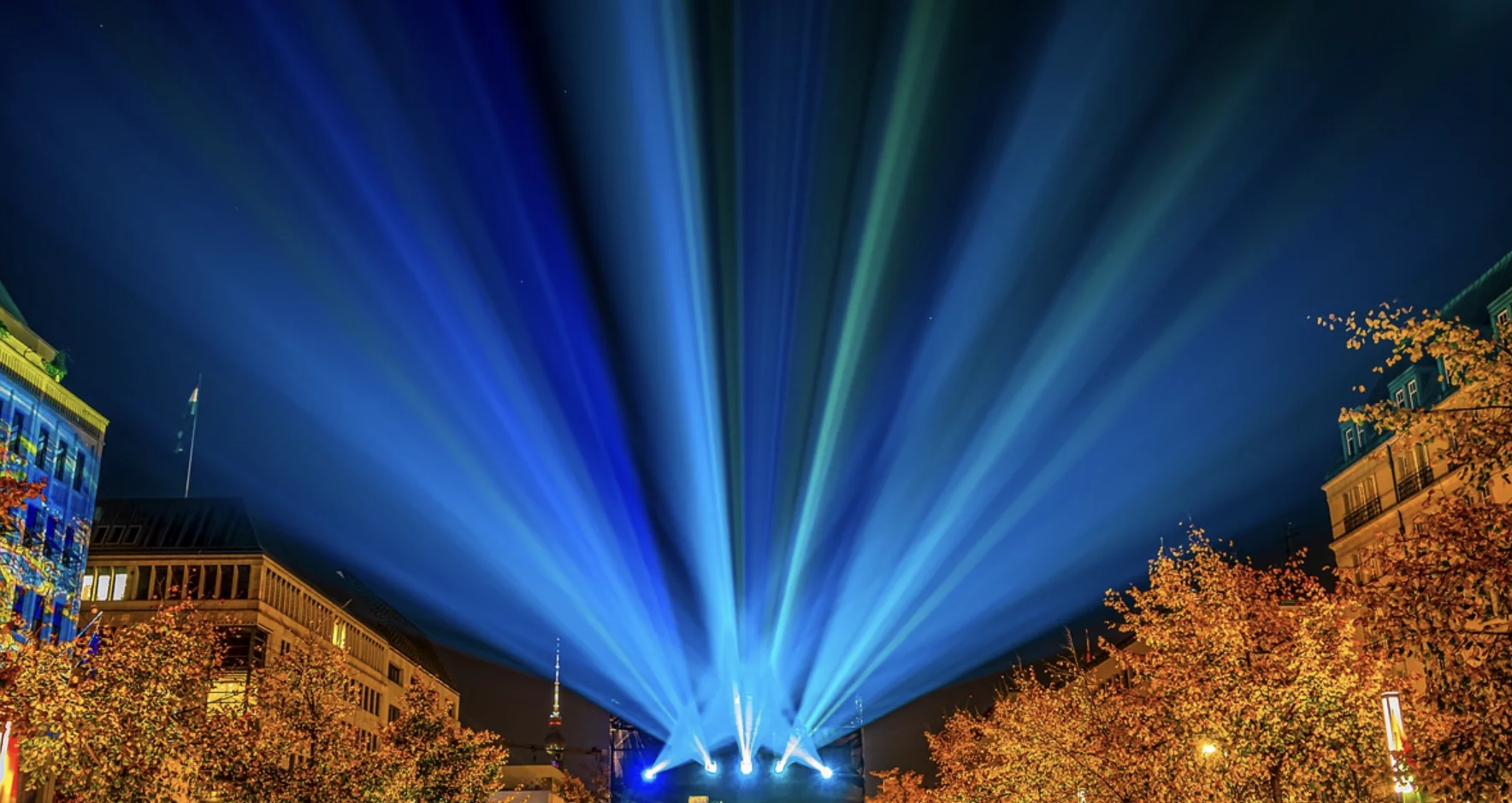 a blue light rays coming out of a building