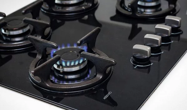 a close up of a gas stove