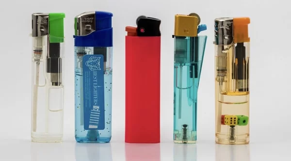 a row of lighters in different colors