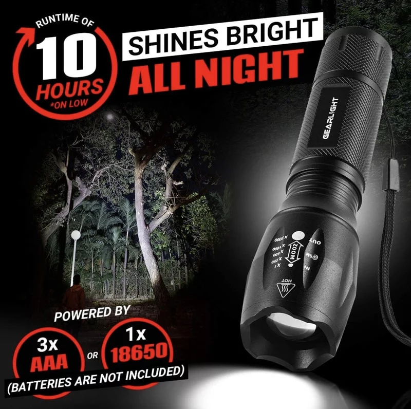a black flashlight with a cord